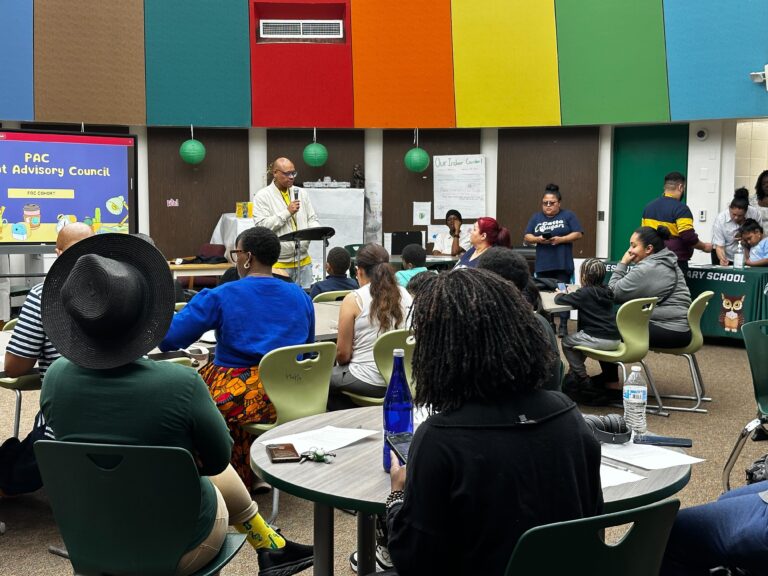 Parents and students build a library at Forest Hill family school in Camden New Jersey to discuss district cuts to fill a $91 million deficit.