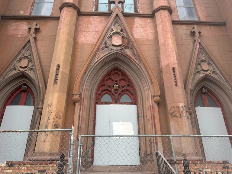 The front door of the historic Church of the Assumption