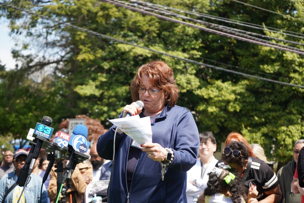 Crozer-Chester Medical Center nurse Peggy Malone speaks out about the impending closure of Crozer Health outside of the hospital in Upland.