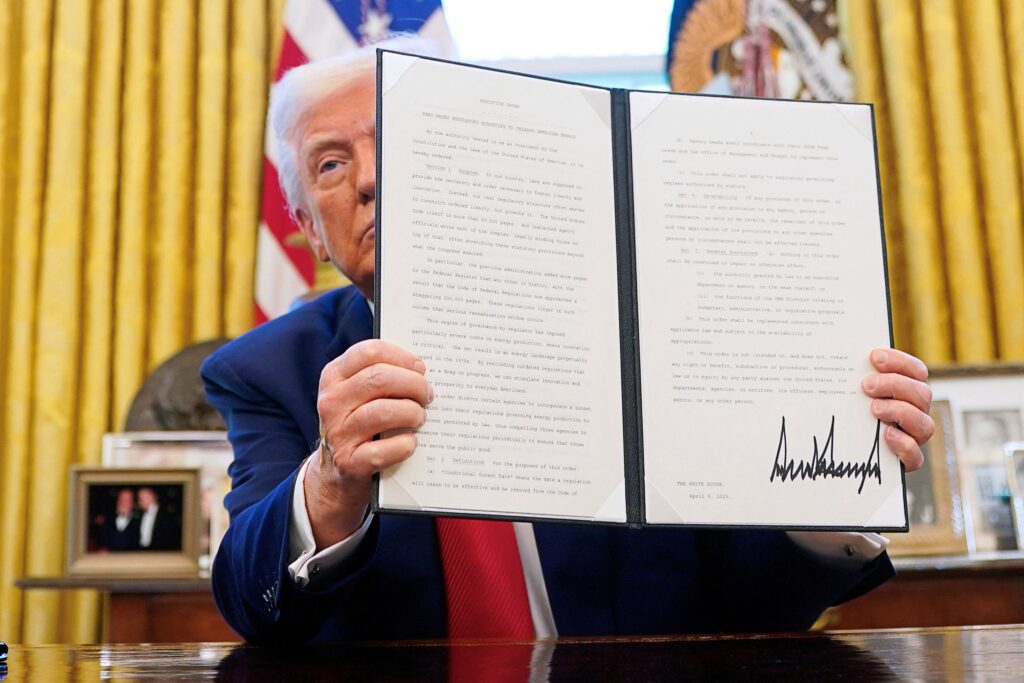 donald-trump-executive-order-2025-04-09 Donald Trump holds a signed executive order