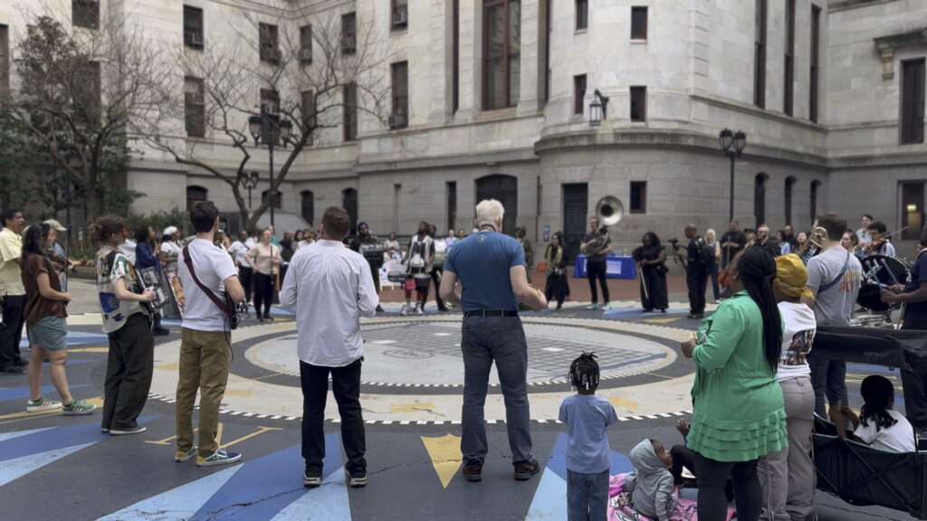 hearing-philadelphia-city-hall-2025-03-29-3 people in a circle at the event in the City Hall courtyard