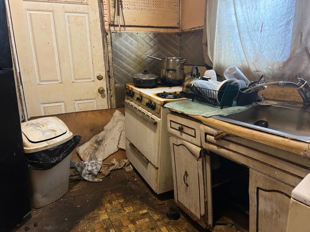 inside a kitchen in need of repair