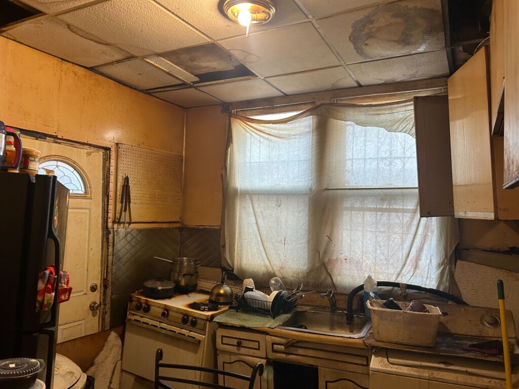 inside a kitchen in need of repair