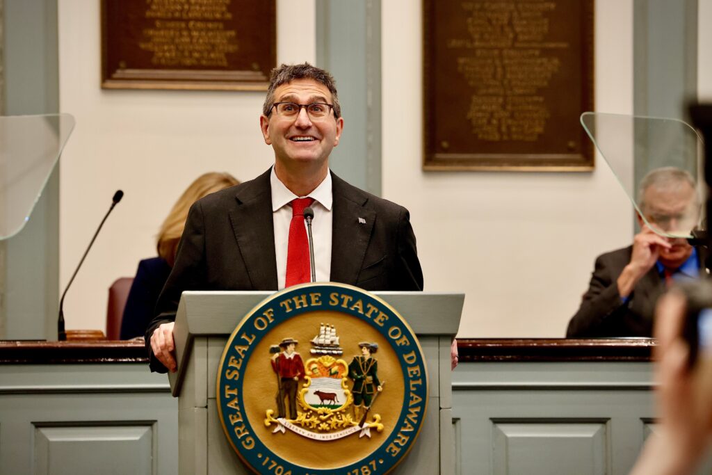 matt-meyer-2025-04-10 Matt Meyer speaks behind a podium