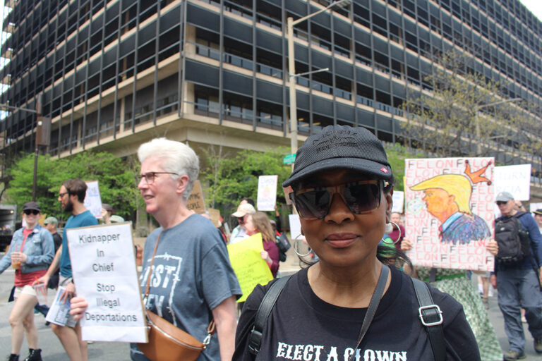 A woman attending a protest in Philadelphia against the Trump administration