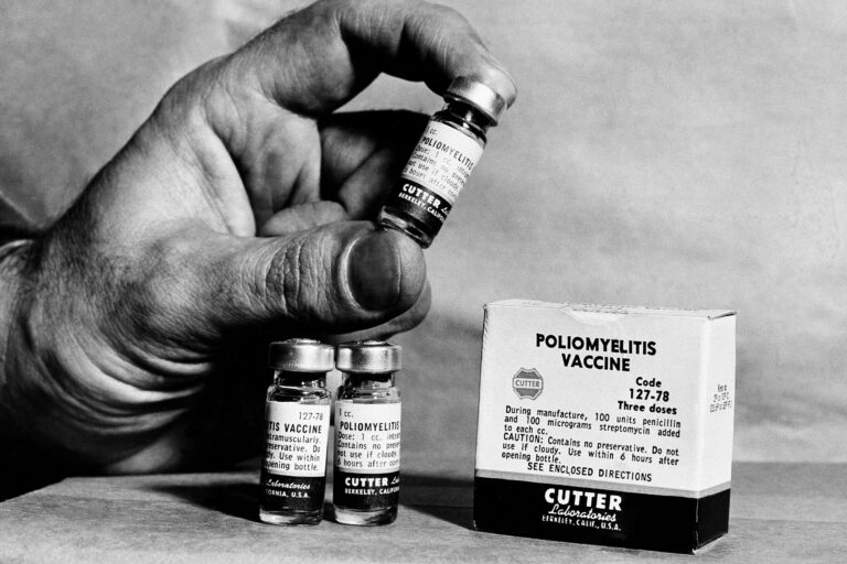 a vile of the polio vaccine held in a hand