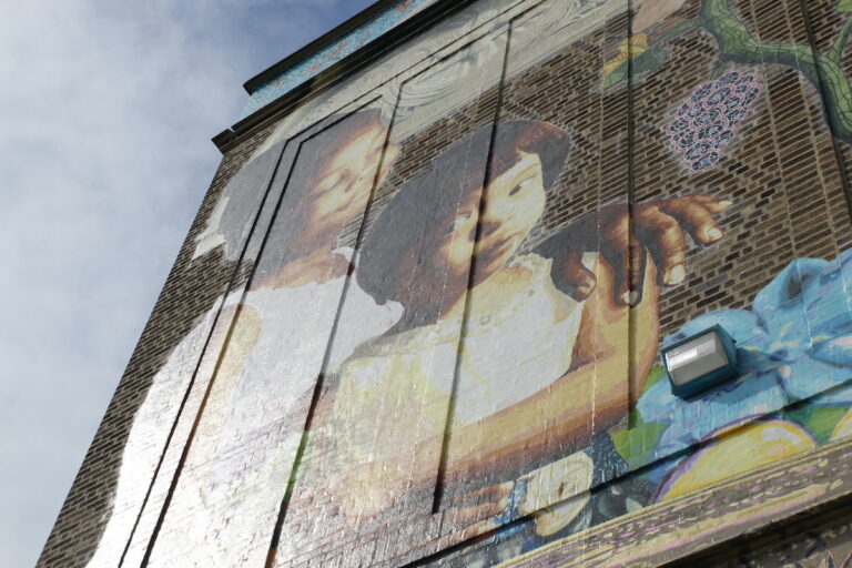 Mural of Julie, a young girl with Down Syndrome, in Philadelphia signed by Pope Francis