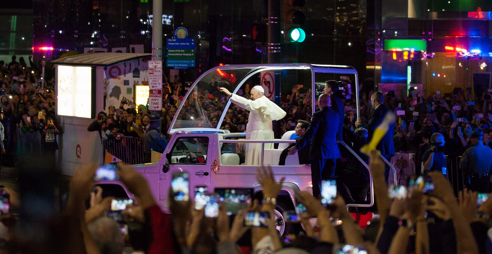 Pope Francis waves to the crowd