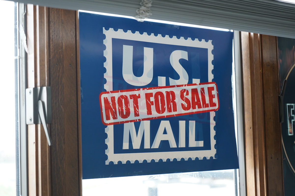 Protest signs opposing the idea of privatizing the Postal Service