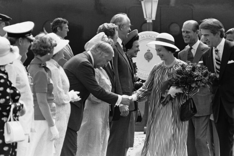 Archival photo of Queen Elizabeth II being greeted as she arrived in Philadelphia