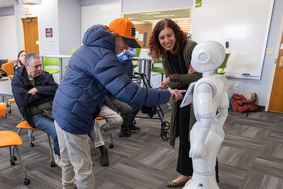 Saint Joseph’s University researcher Sara Girotto worked with a Bancroft residents and robot aid