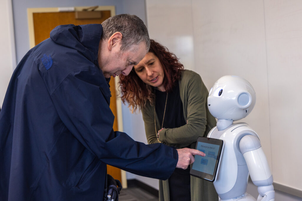 st-joes-ai-robots-for-adults-with-autism-KP-041825-O7 Bancroft residents answer trivia questions posed by Pepper