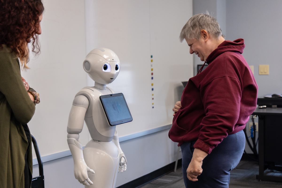 Bancroft resident interacts with robot as it learns about participants