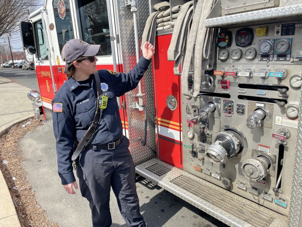 Captain Bergen checking out her truck