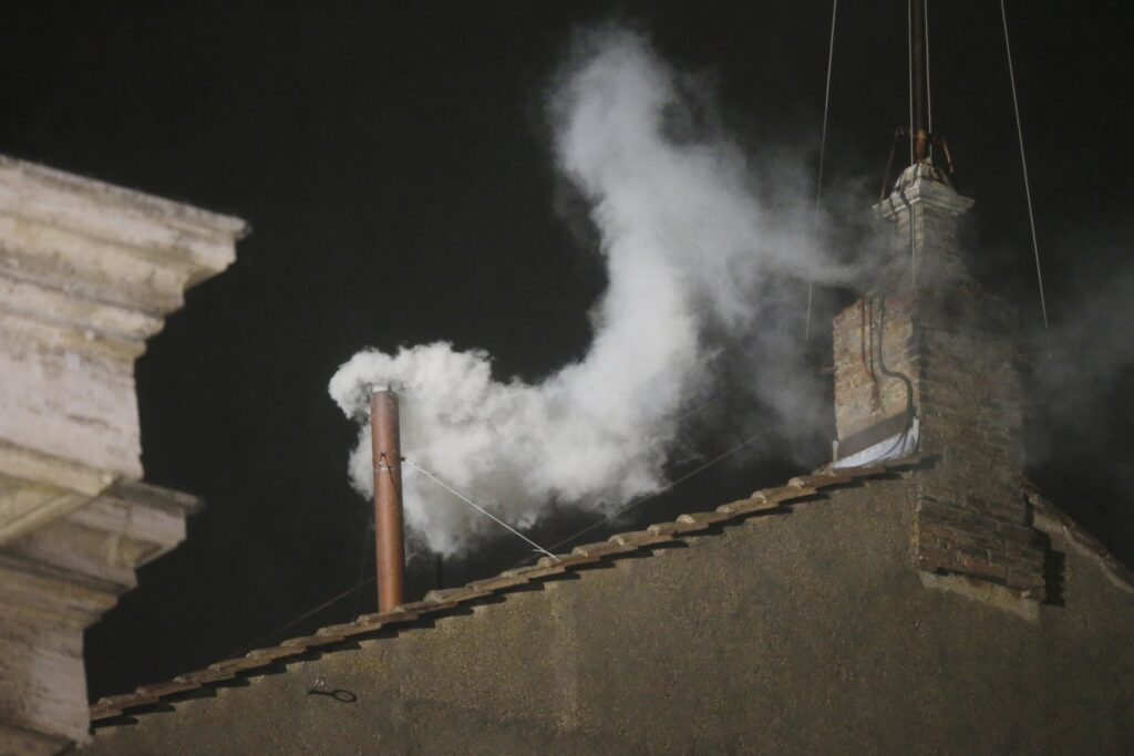 Vatican Obit Pope Francis What’s Next Explainer white smoke coming out of a chimney at night