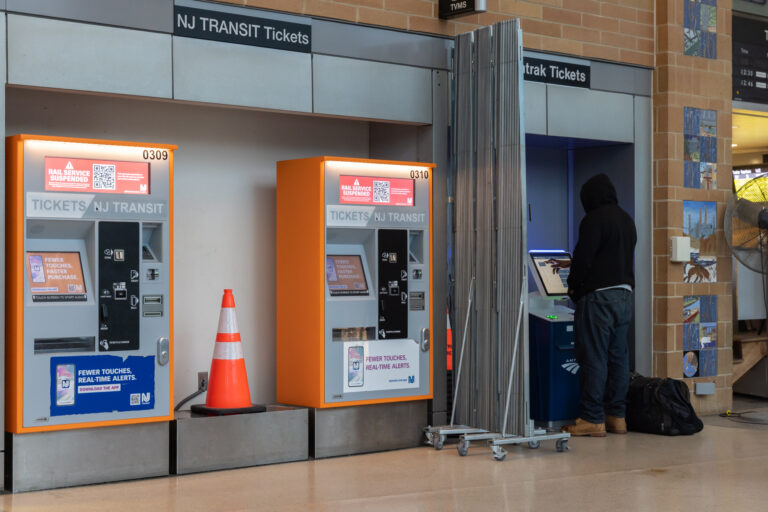 a person buying a ticket at the Trenton Transit Center