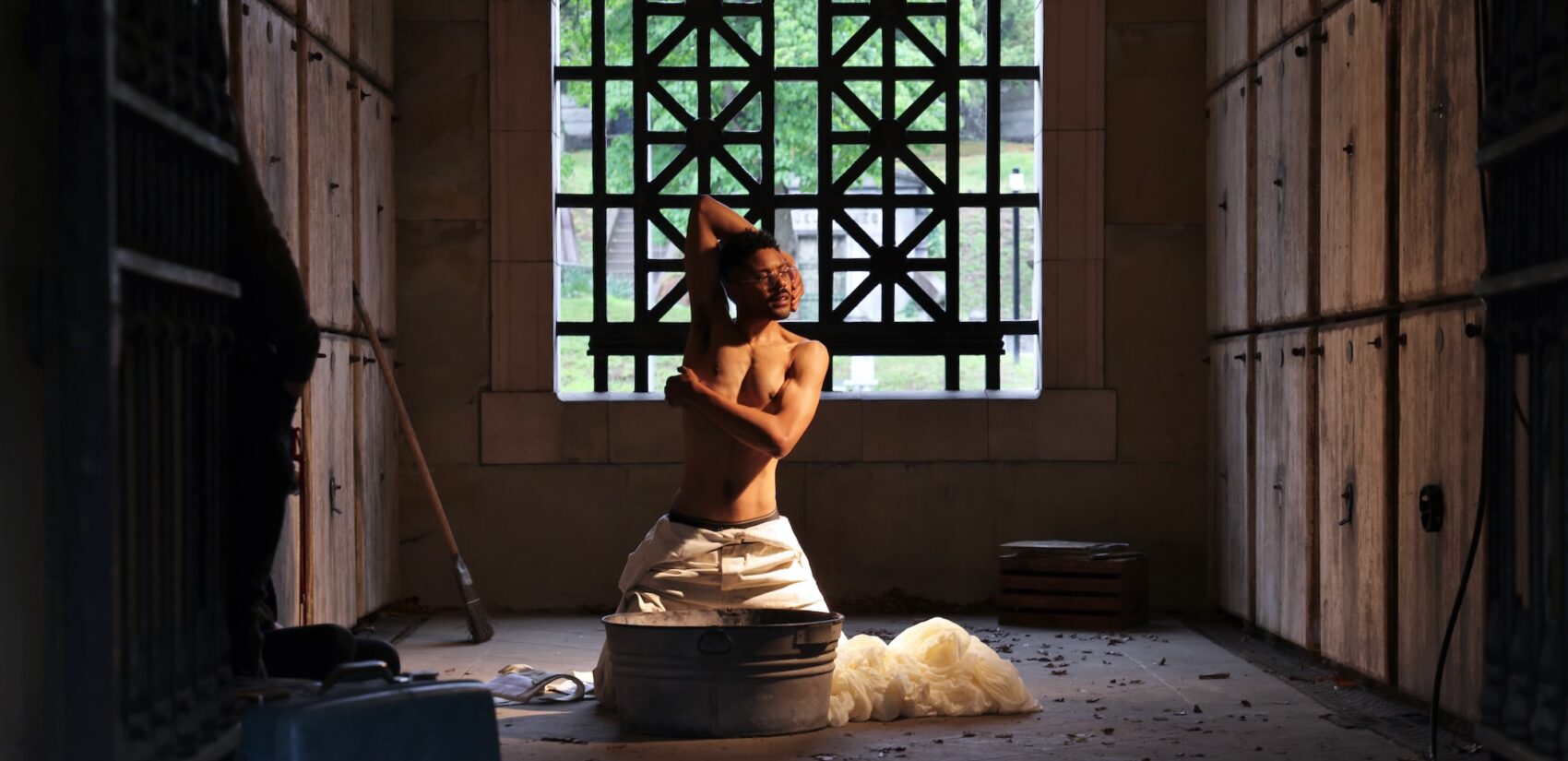 DonChristian Jones performing inside he Receiving Vault at Laurel Hill Cemetery for the Death and Arts Festival