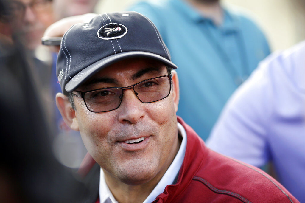 Ruben Amaro In this Feb. 13, 2014, file photo, Philadelphia Phillies' general manager Ruben Amaro Jr. speaks to reporters before a spring training baseball practice in Clearwater, Fla. (AP Photo/Charlie Neibergall)