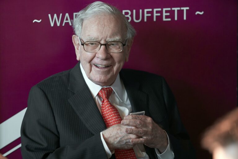 Warren Buffett, chairman and CEO of Berkshire Hathaway, smiles as he plays bridge following the annual Berkshire Hathaway shareholders meeting in Omaha, Neb. (AP Photo/Nati Harnik, File)