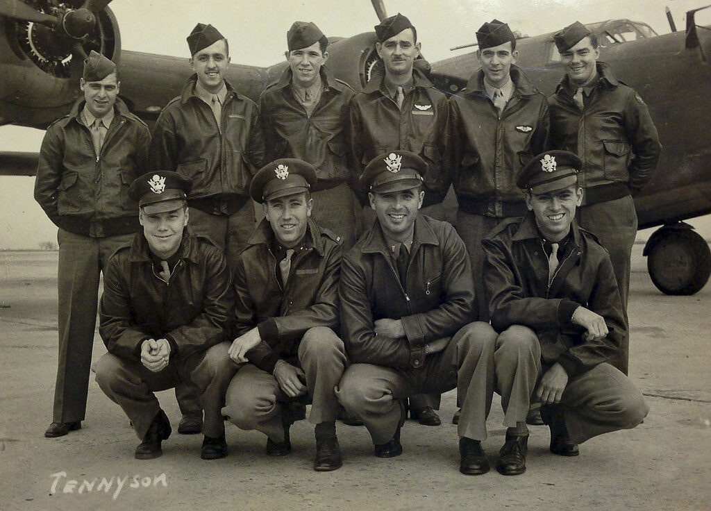 A black and white photo of World War II veterans