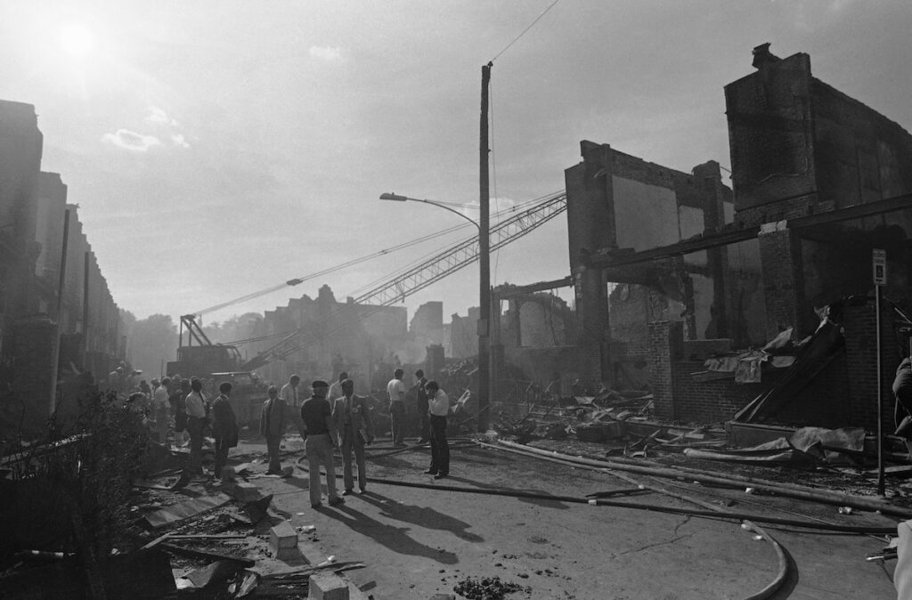 Two city blocks of rowhouses are left in ruin following the worst fire in the city's history, May 15, 1985 in West Philadelphia. The blaze was caused accidently when police attempted to remove a radical group called MOVE from their house by dropping a satchel bomb on the structure a gun battle. (AP Photo)