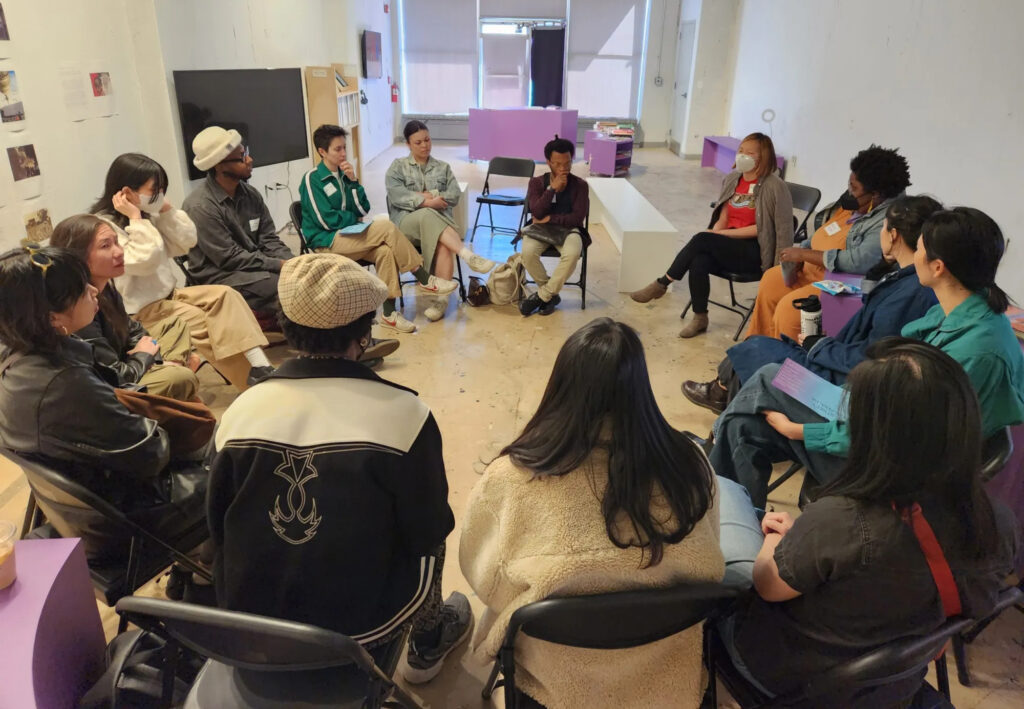 Attendees participate in a workshop at the Afro-Asian Solidarity Symposium at the Asian Arts Initiative's exhibit, Crescendo