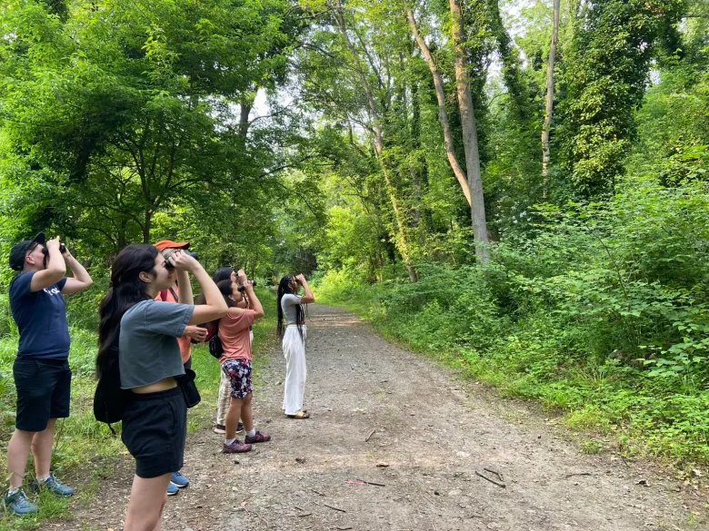 Feminist-Bird-Club-Philly Feminist Bird Club Philly members looking through binoculars