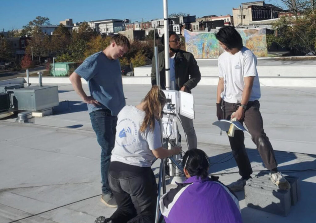 Philly-Community-Wireless Philly Community Wireless volunteers install an outdoor wireless system