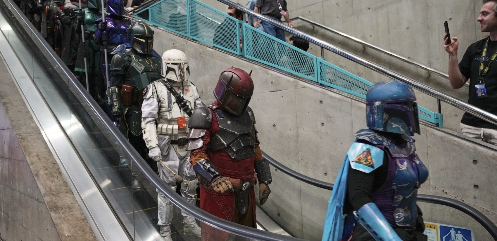 Star Wars fans in different creations of the Boba Fett uniforms attend a fan convention, the Star Wars Celebration in Chiba, near Tokyo (AP Photo/Hiro Komae, File)