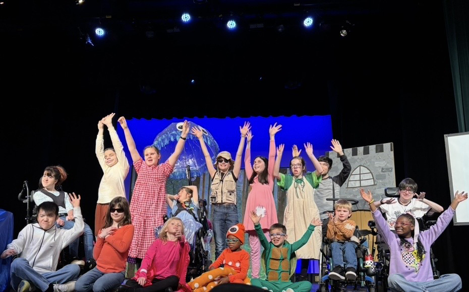 Students with Acting Without Boundaries on stage