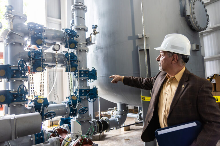 Marc Lucca explaining PFAS filtration tanks