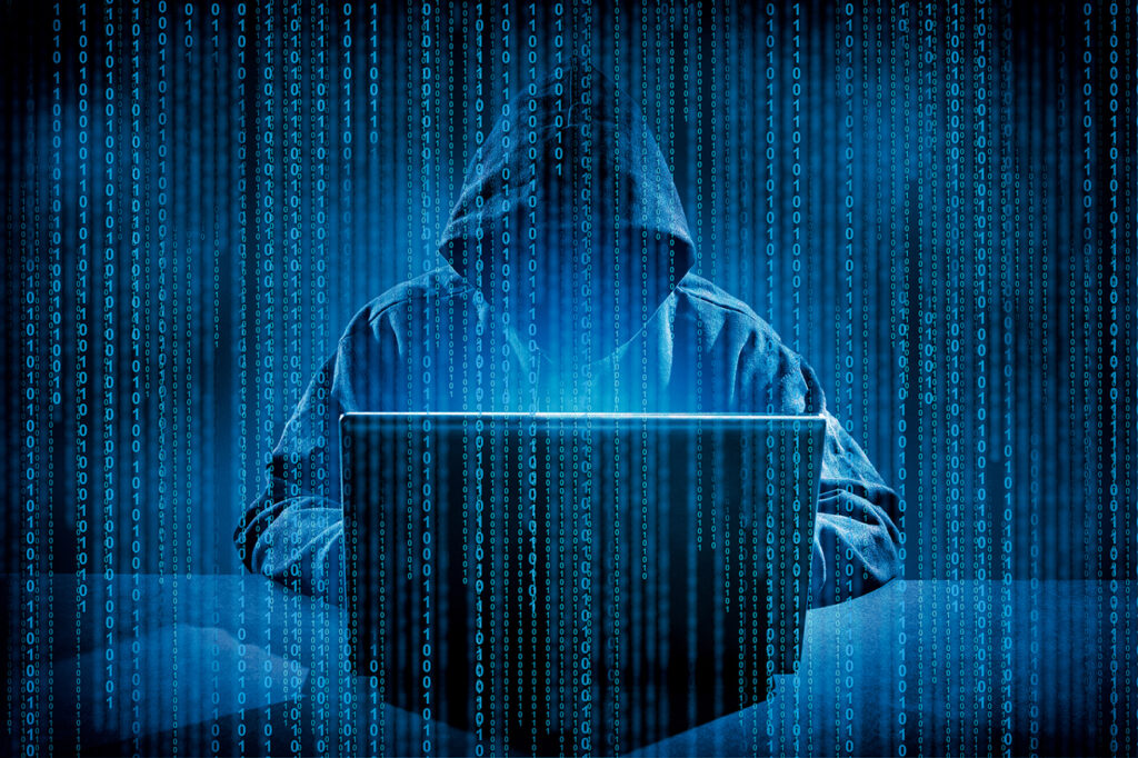 bigstock–157700702 Save Download Preview Hacker using laptop. Hacking the Internet.