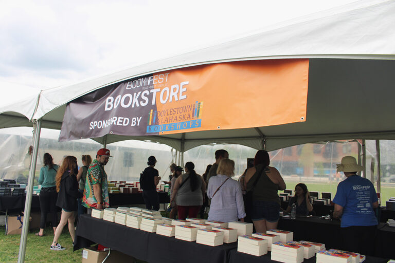 Hundreds of people attended the main event of the seventh annual Bucks County Book Festival on Saturday, May 3, 2025, at Broad Commons Park in Doylestown. (Emily Neil/WHYY)