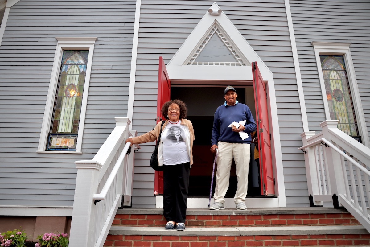 Emily Dempsey stands in front of the new home for the East Lynne Theater Company