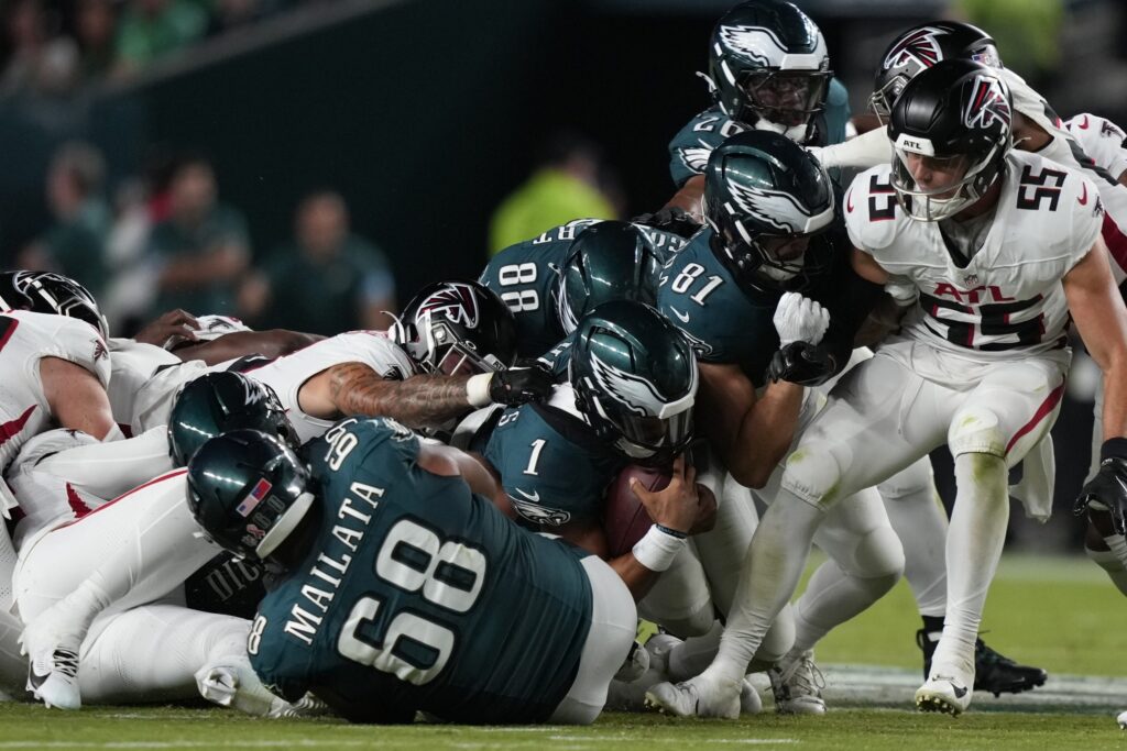 eagles-falcolns-tush-push-ap-2025-05-21 Jalen Hurts scoring a touchdown using the Tush Push play