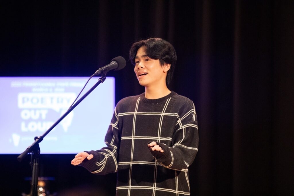 evan-wang-national-youth-poet-laureate-2 Evan Wang performs on stage at the Pennsylvania State Poetry Out Loud Championship