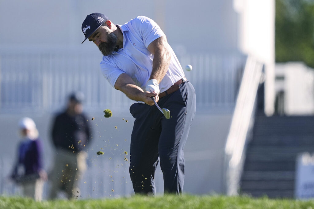 Former Philadelphia Eagles football player Jason Kelce hits on the 16th hole during a pro-am before the Truist Championship golf tournament at the Philadelphia Cricket Club, Wednesday, May 7, 2025, in Flourtown, Pa. (AP Photo/Matt Rourke)