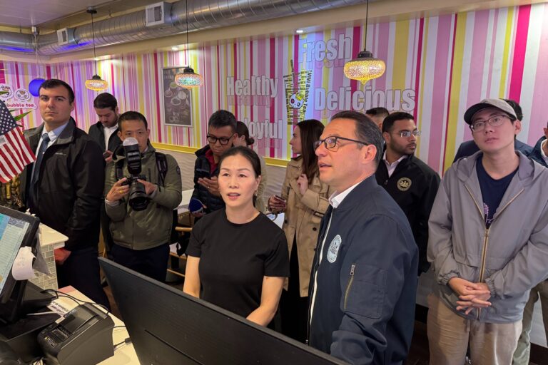 Josh Shapiro talks with RongYan Lin, owner of Vivi