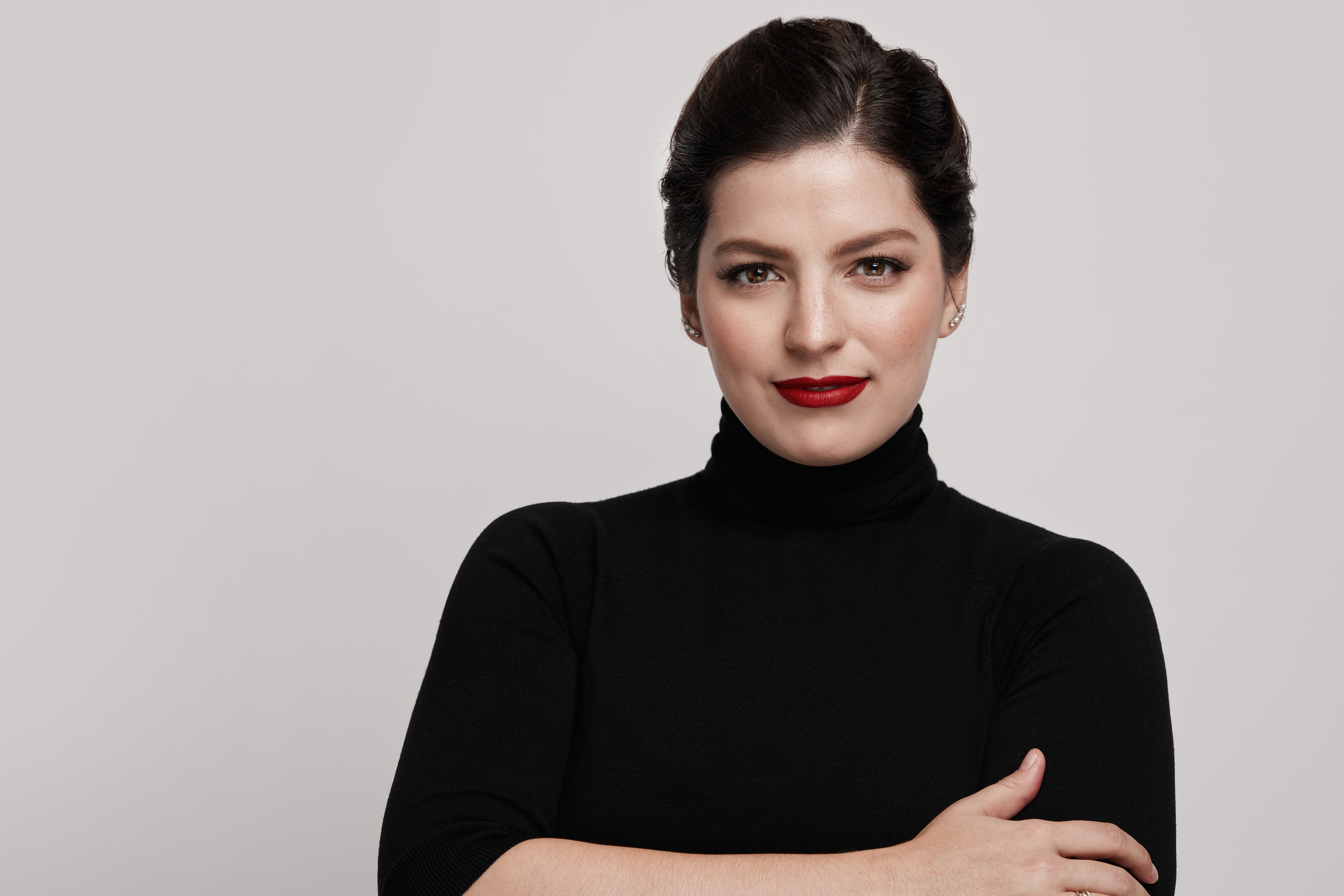 Michelle Di Russo looks into the camera