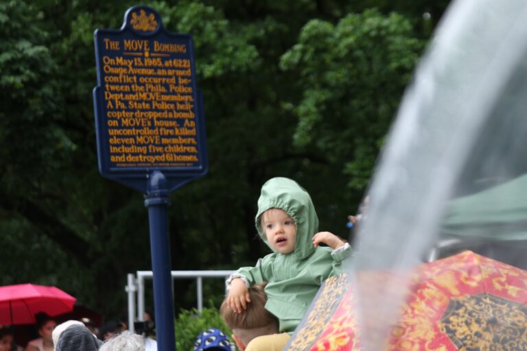 Around 100 people gathered next to the MOVE bombing historical marker