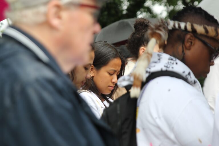 Around 100 people gathered next to the MOVE bombing historical marker