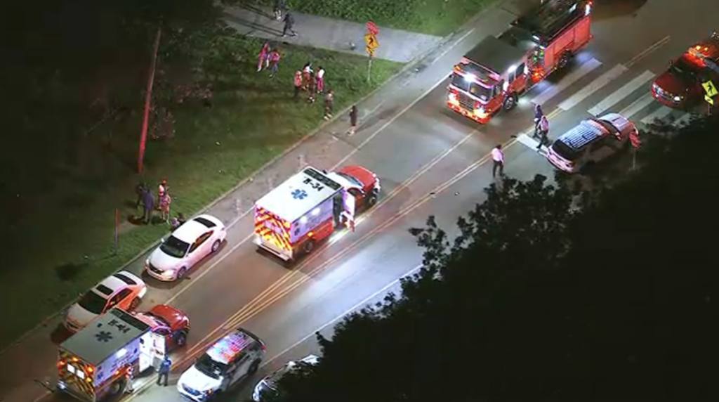 Police are seen on the scene of a mass shooting in Fairmount Park