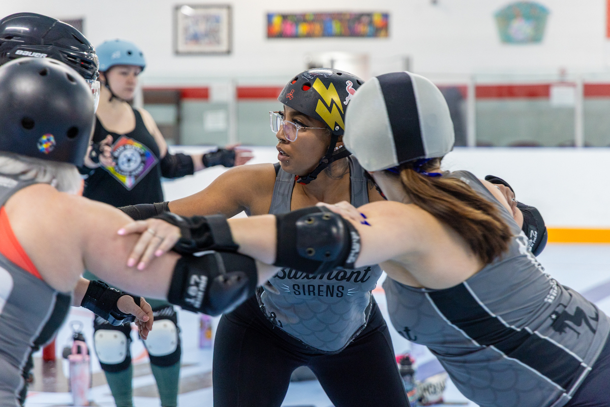 Kristin Janifer participating in roller derby match