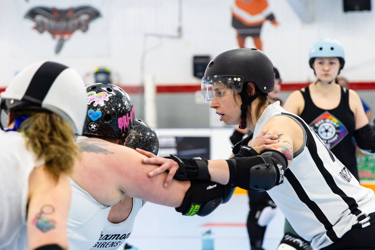 Alana DeLuca participating in roller derby match