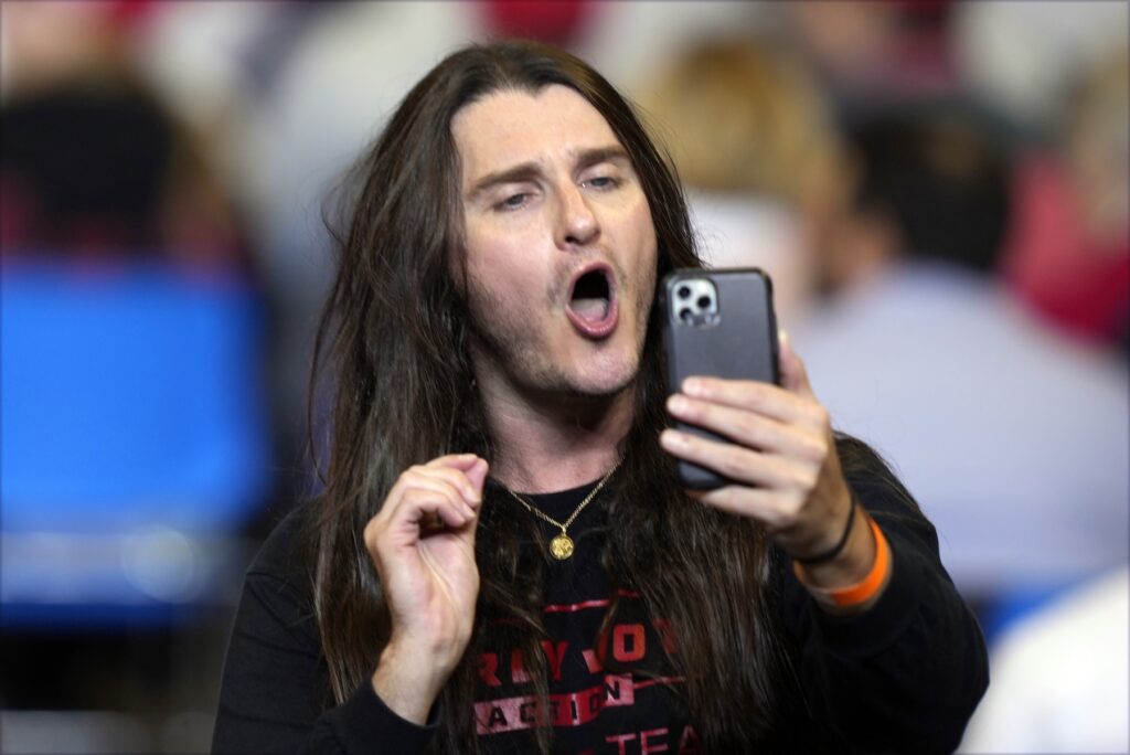 Election 2024 Trump Scott Presler with his phone
