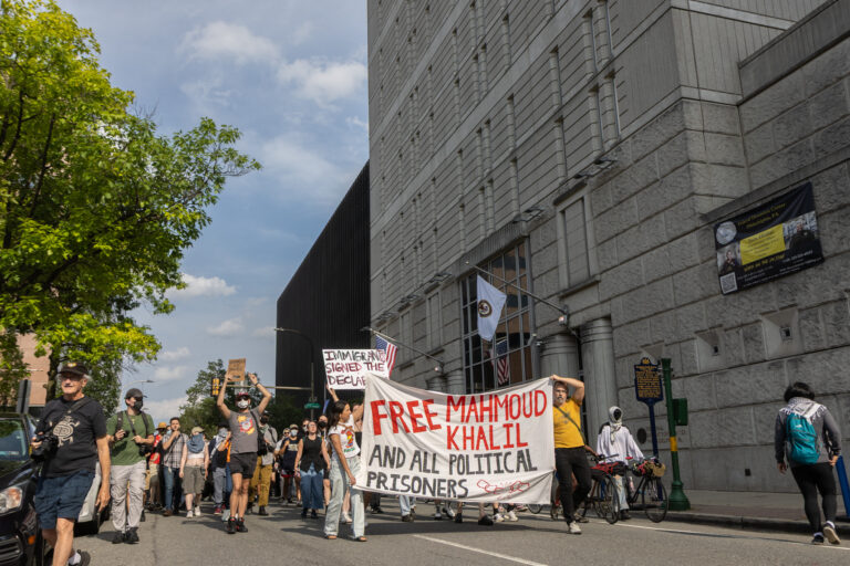 Protesters call for an end to deportations outside the Federal Detention Center on Arch Street in Philadelphia on June 10, 2025.