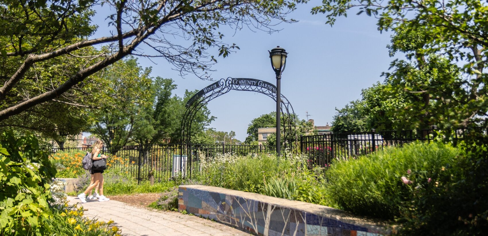 a walkway outside of the Summer Winter Community Garden