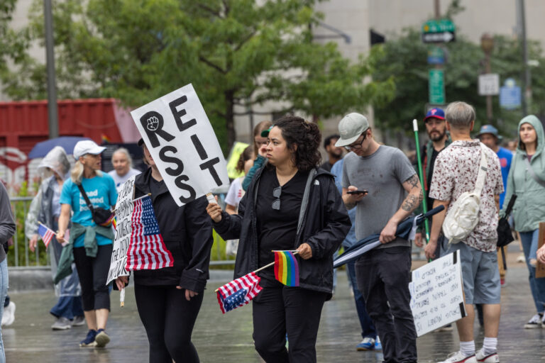 People in Center City Philadelphia gathered to protest the Trump administration’s agenda on June 14, 2025. (Kimberly Paynter/WHYY)