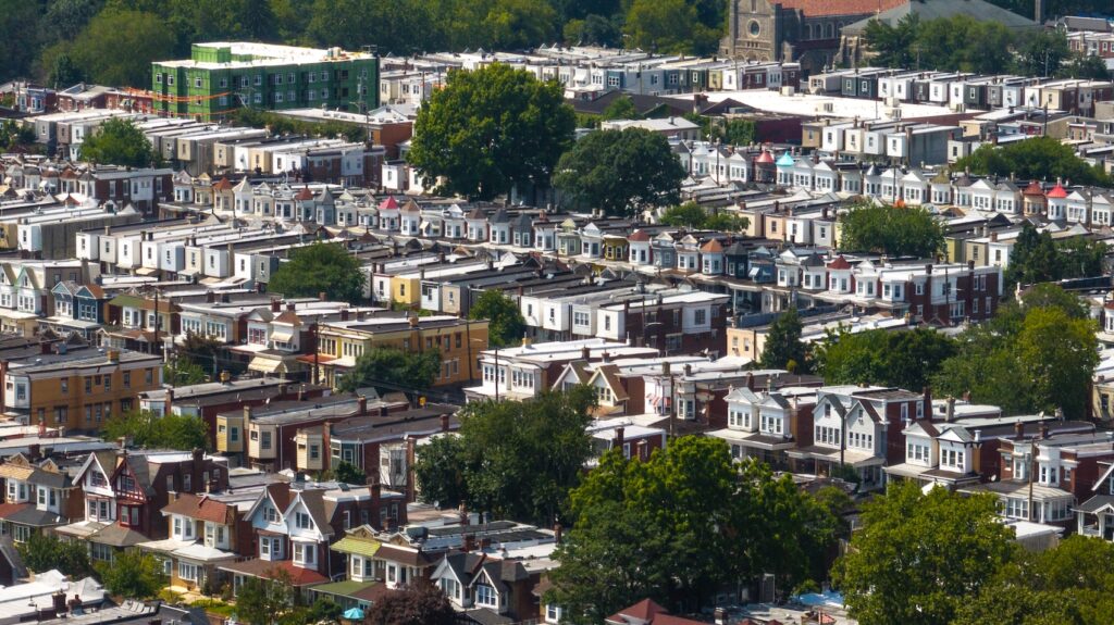 West Philadelphia row homes. (Kimberly Paynter/WHYY) An aerial view of residential streets in West Philadelphia