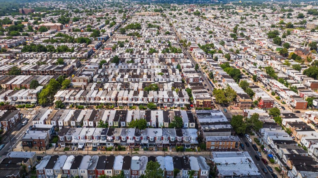 West Philadelphia row homes. (Kimberly Paynter/WHYY) An aerial view of residential streets in West Philadelphia